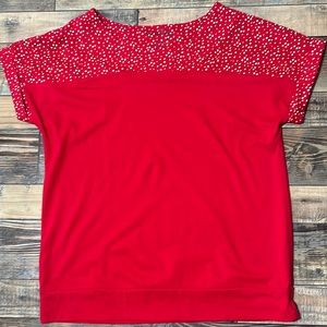 Red top shirt with white polka dots